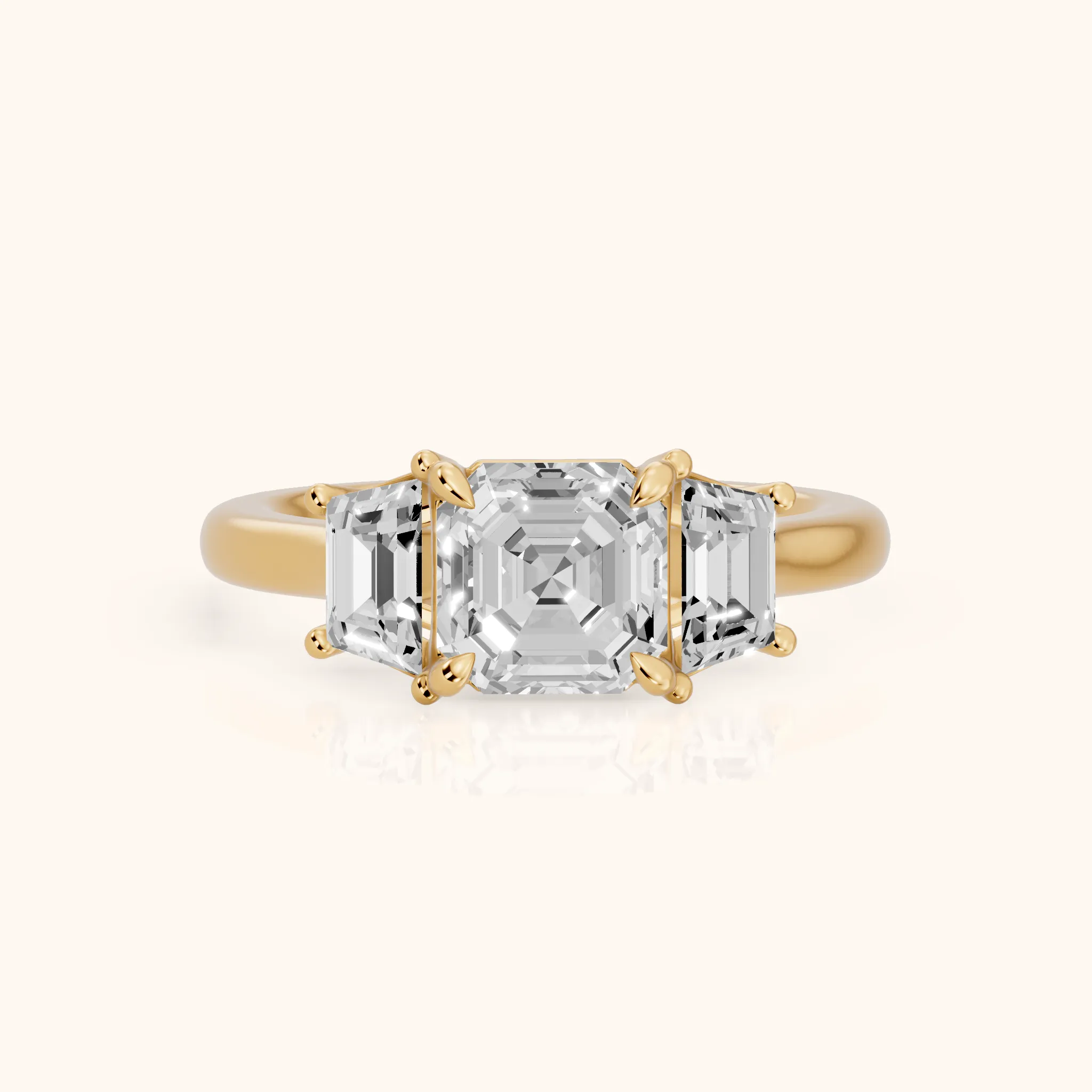 Filippa Trapezoid Three-Stone Asscher Diamond Engagement Ring in Yellow Gold — view 1
