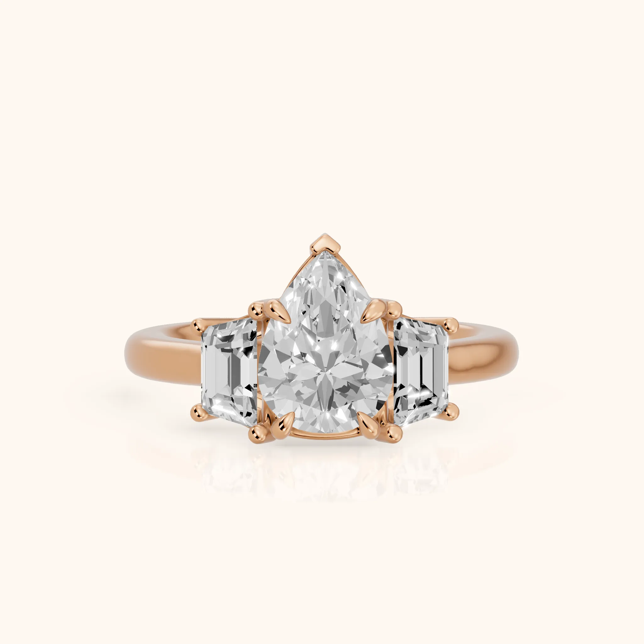 Filippa Trapezoid Three-Stone Pear Diamond Engagement Ring in Rose Gold — view 1