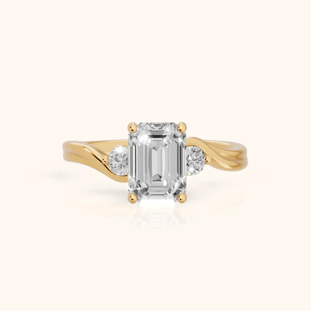 Rena Bypass Three-Stone Emerald Diamond Engagement Ring in Yellow Gold — view 2