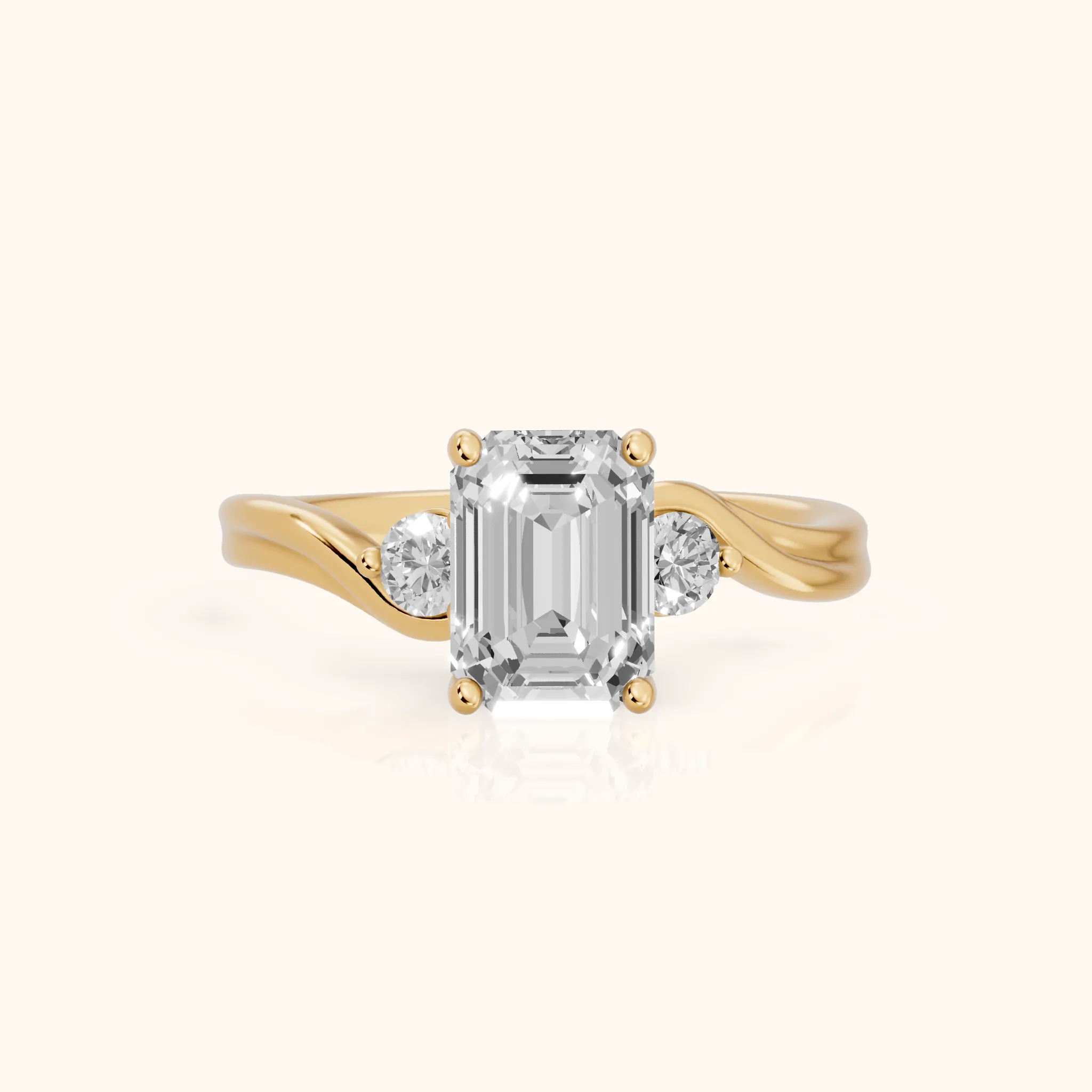 Rena Bypass Three-Stone Emerald Diamond Engagement Ring in Yellow Gold — view 1