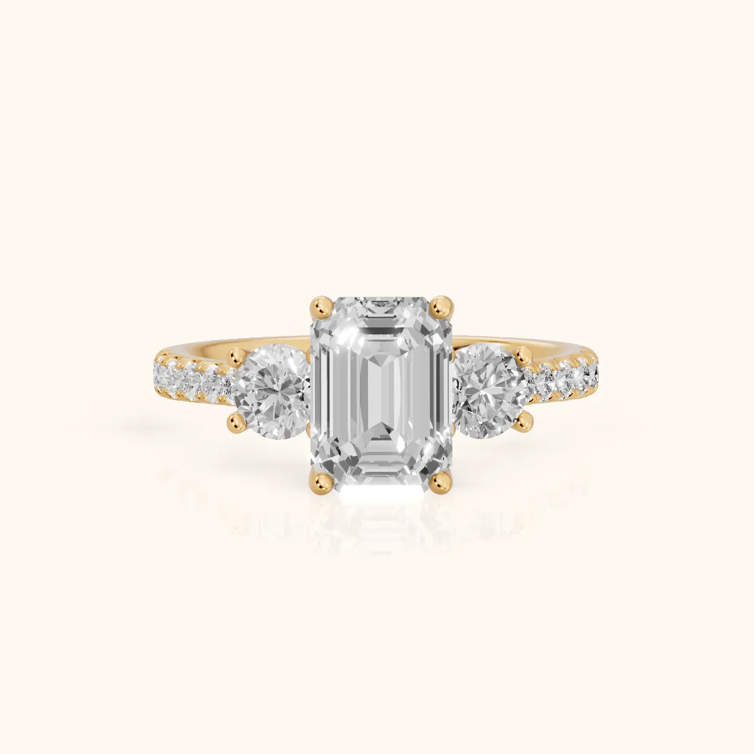 Sibyl Trellis Three-Stone Emerald Diamond Engagement Ring in Yellow Gold — view 2