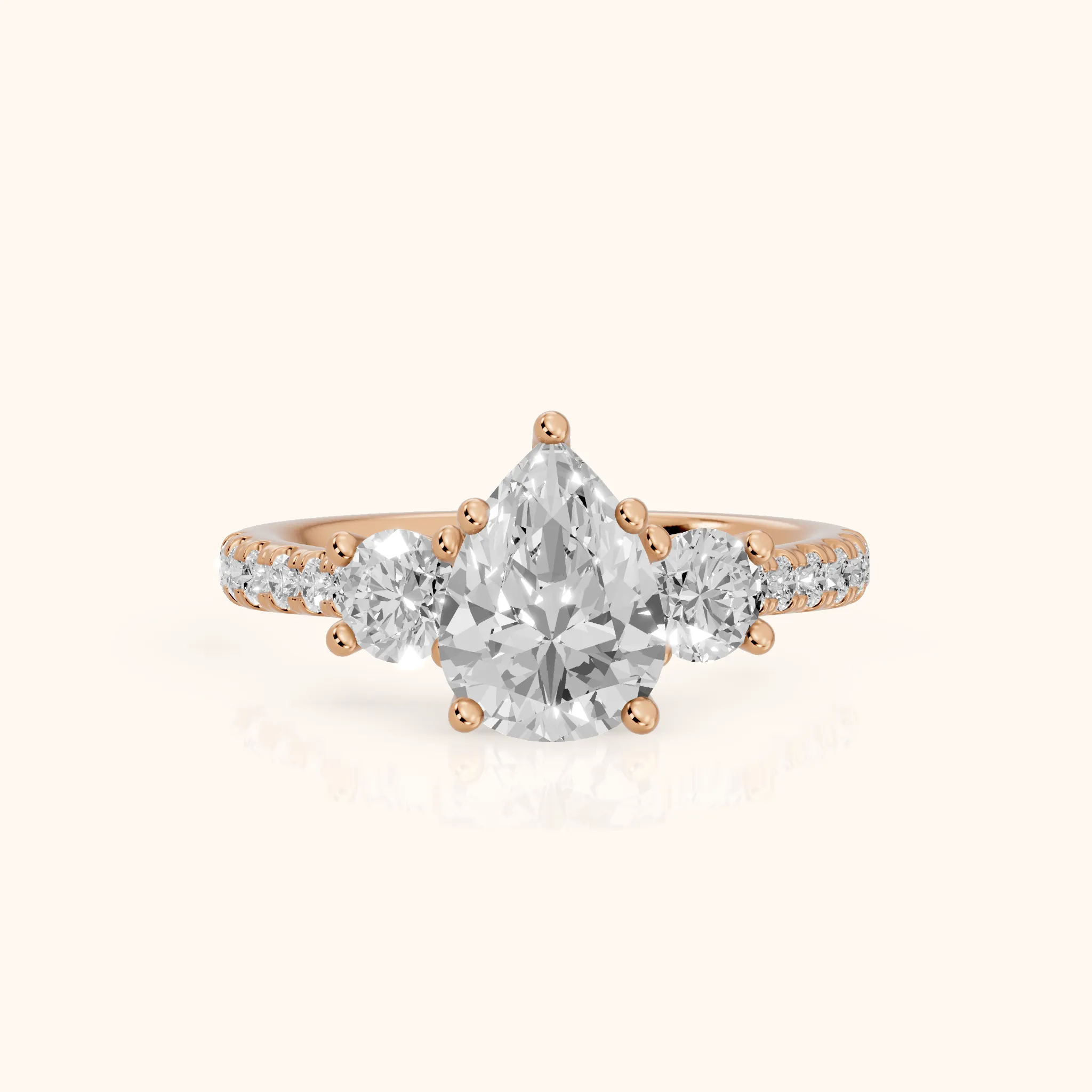 Sibyl Trellis Three-Stone Pear Diamond Engagement Ring in Rose Gold — view 1