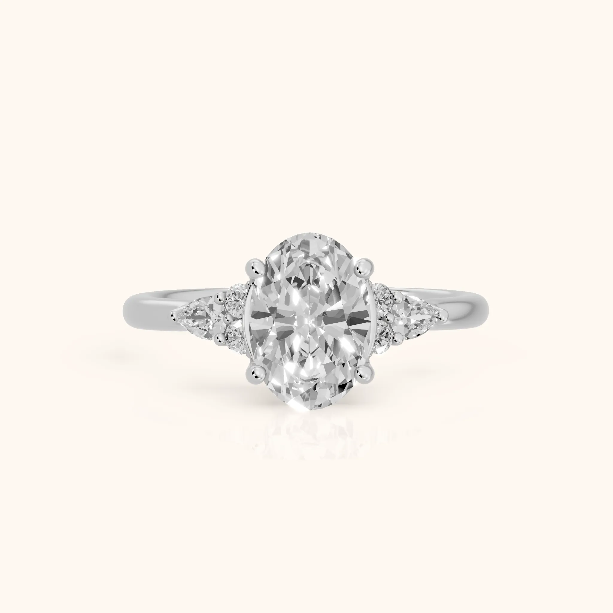 Zelie Pear-Side Cluster Oval Diamond Engagement Ring in White Gold — view 1