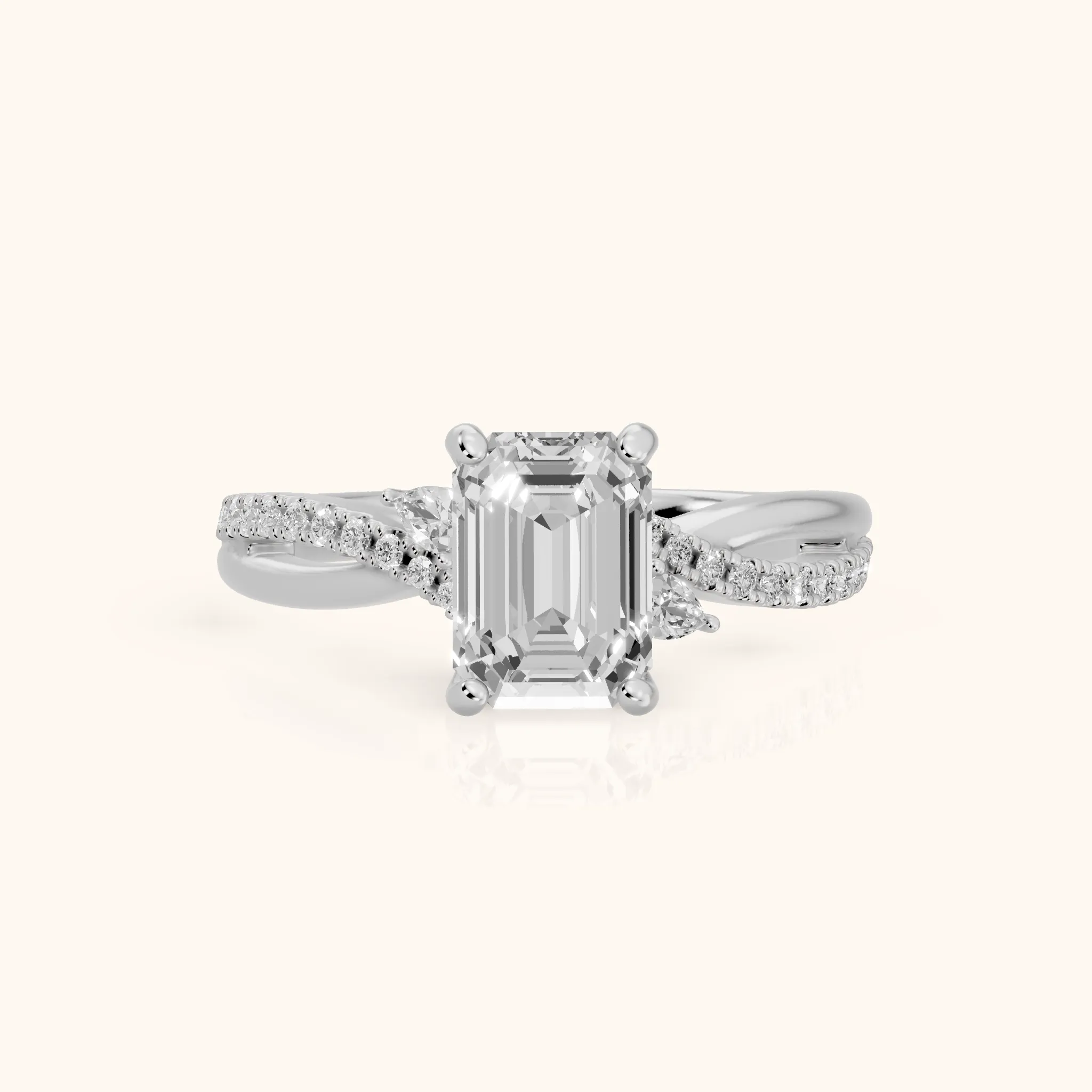 Reno Pear-Side Twist Emerald Diamond Engagement Ring in Platinum — view 1