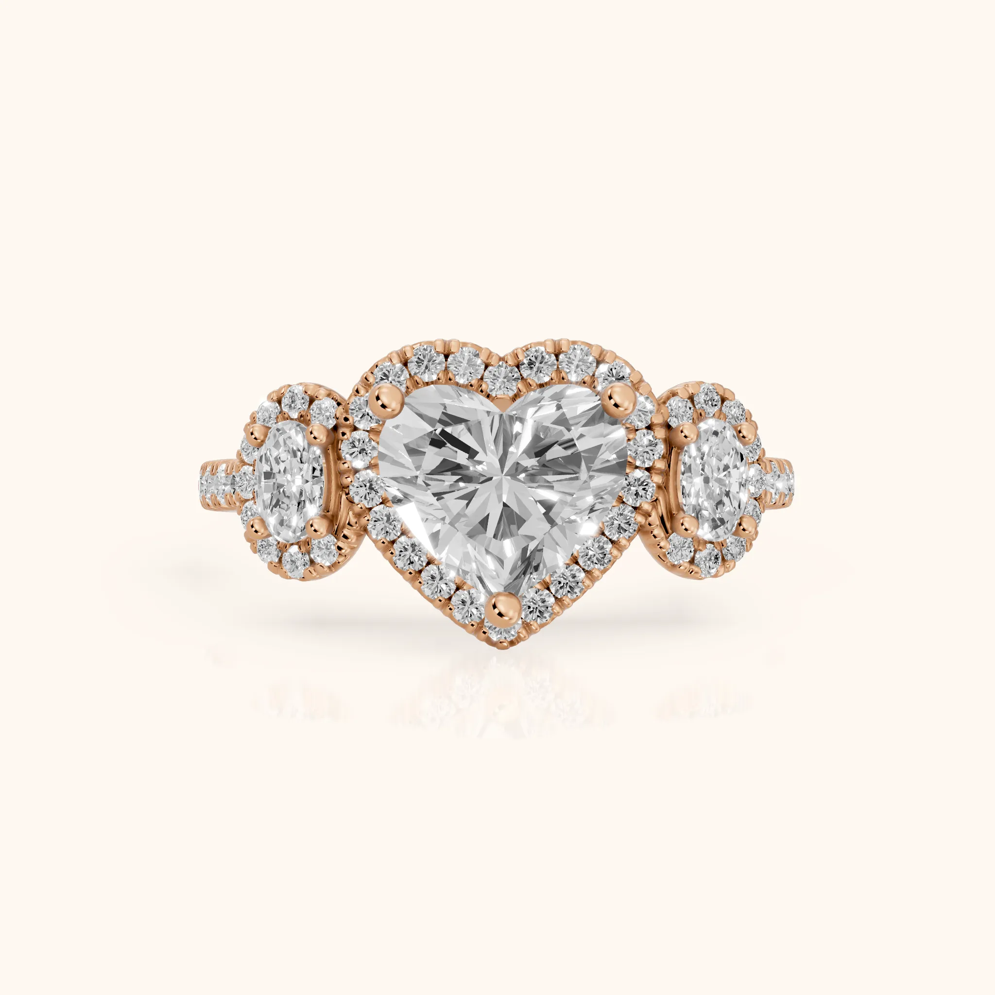 Austin Three-Stone Halo Heart Diamond Engagement Ring in Rose Gold — view 1