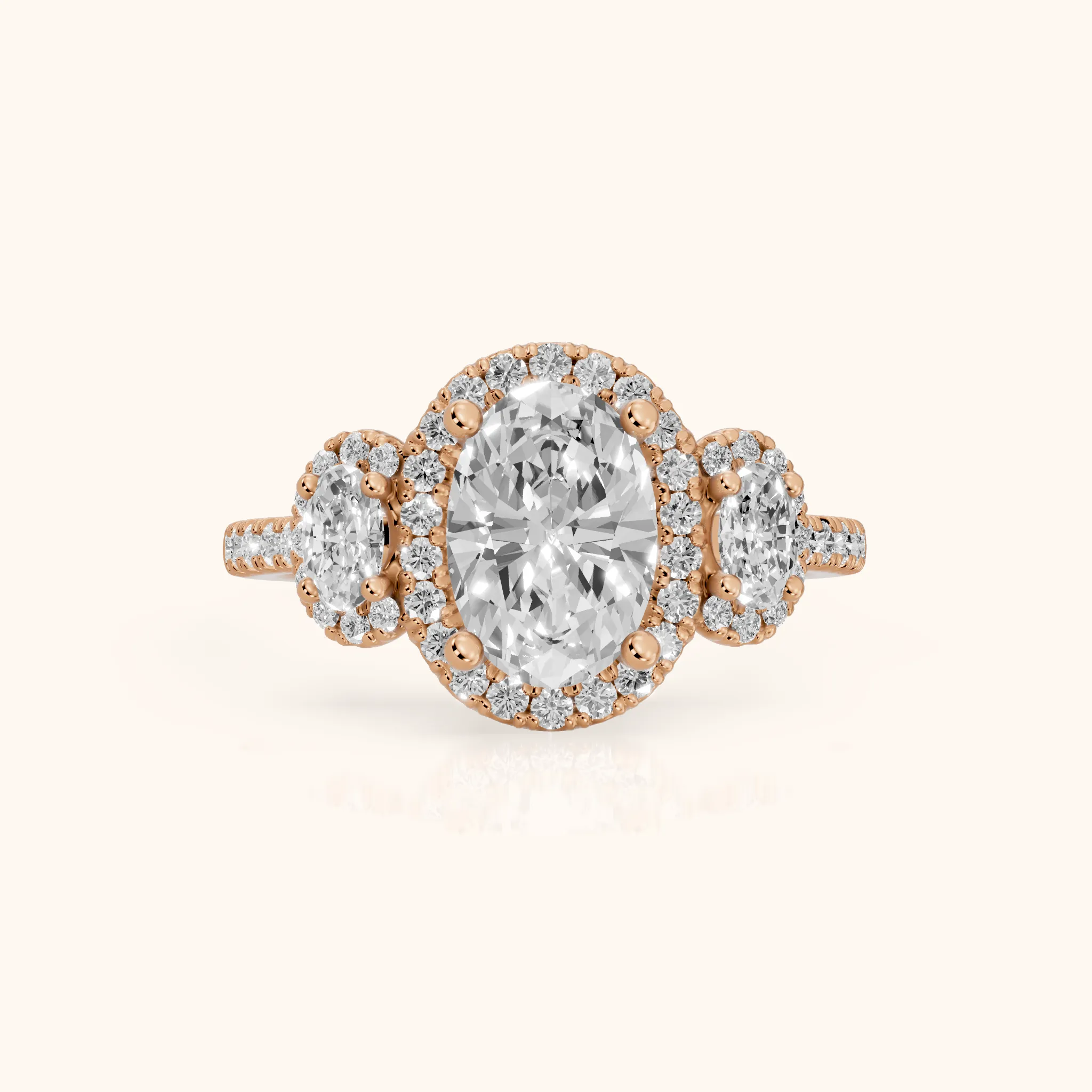 Austin Three-Stone Halo Oval Diamond Engagement Ring in Rose Gold — view 1