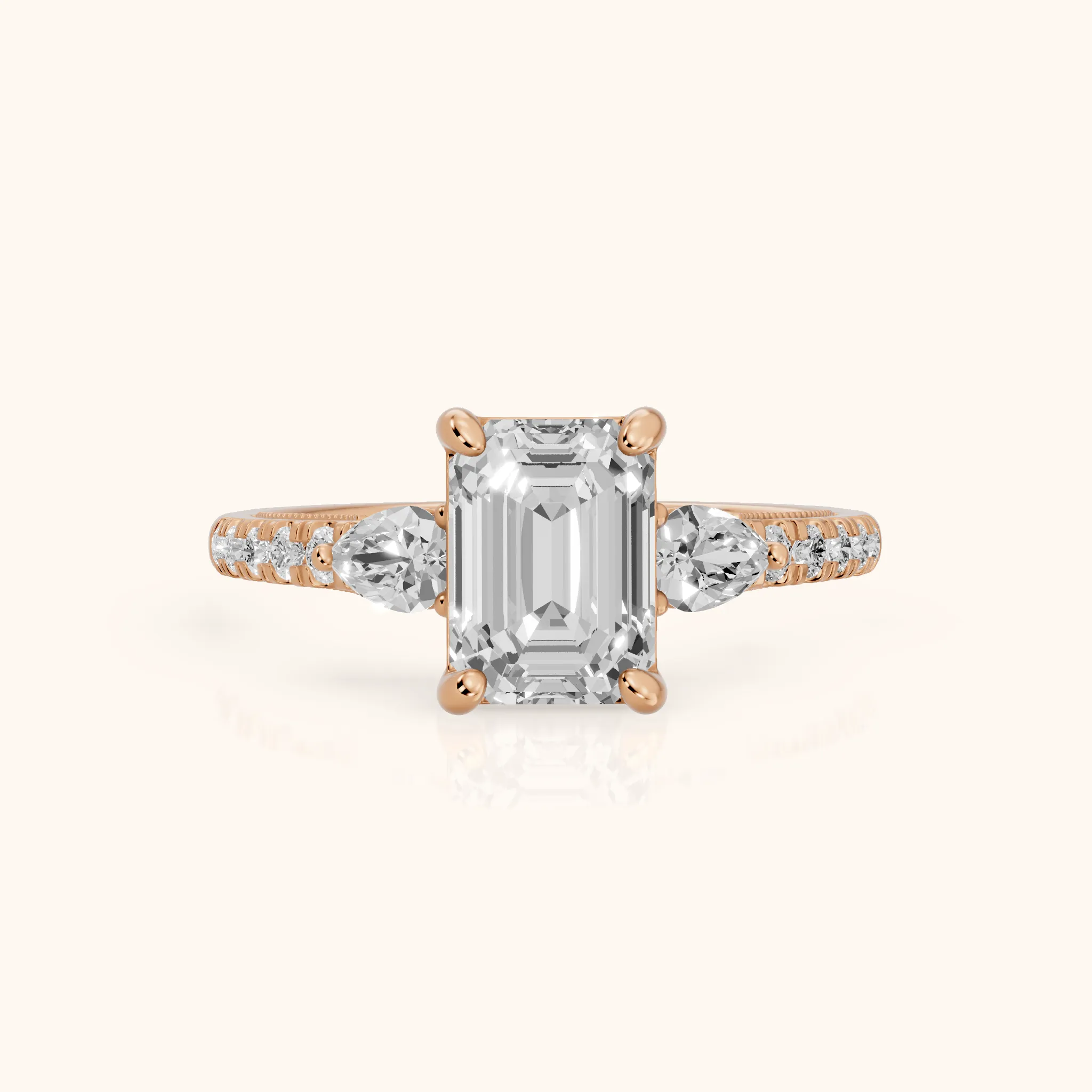 Weston Pear-Side Three-Stone Emerald Diamond Engagement Ring in Rose Gold — view 1