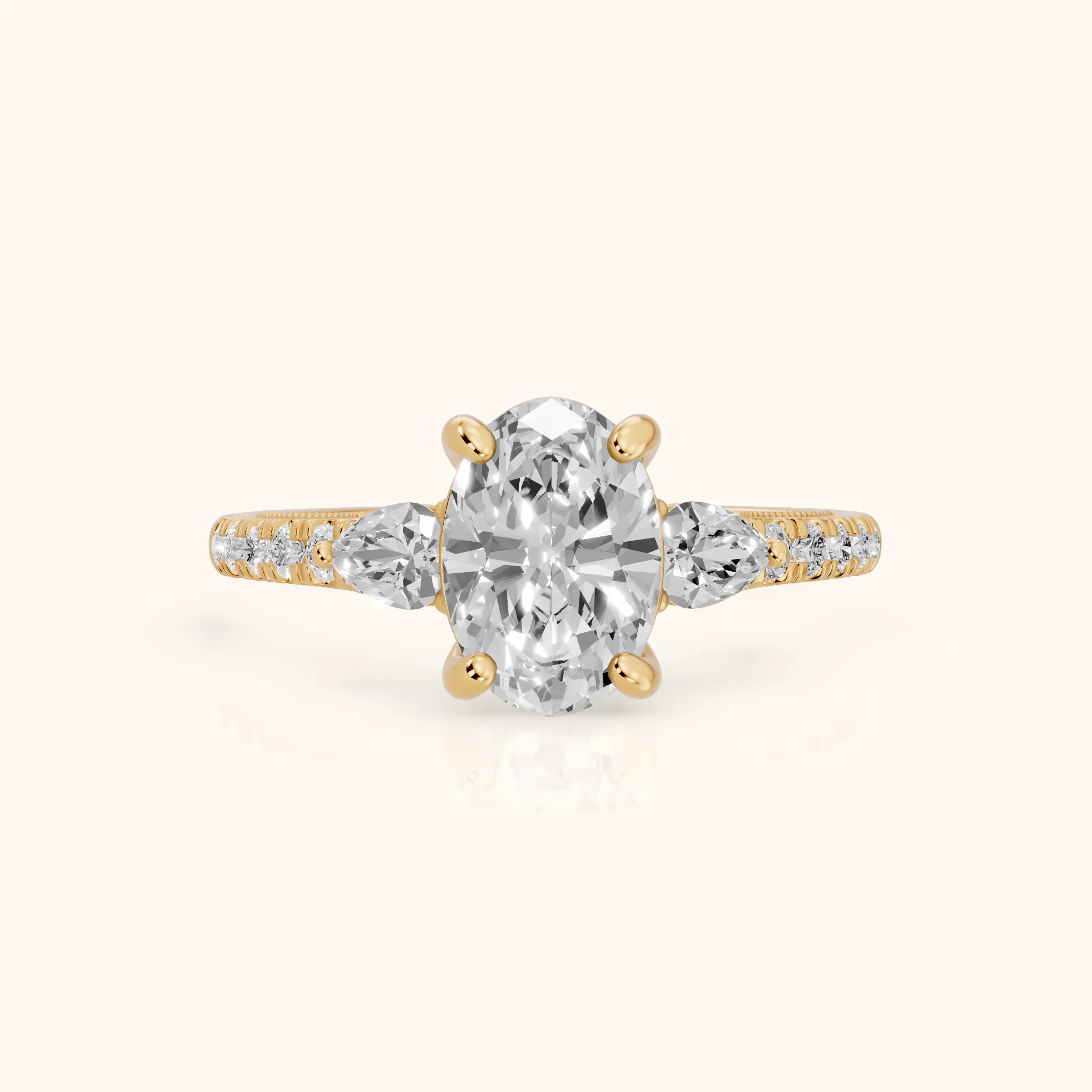 Weston Pear-Side Three-Stone Oval Diamond Engagement Ring in Yellow Gold — view 1
