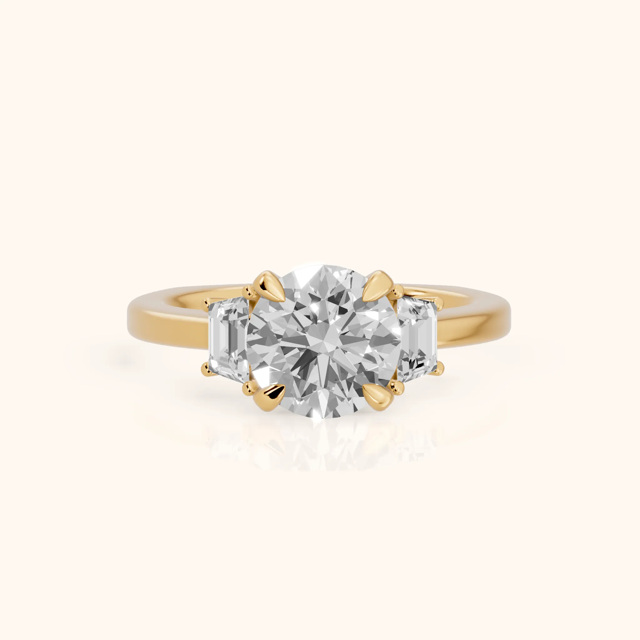 Irvine Trapezoid Three-Stone Round Diamond Engagement Ring in Yellow Gold — view 1