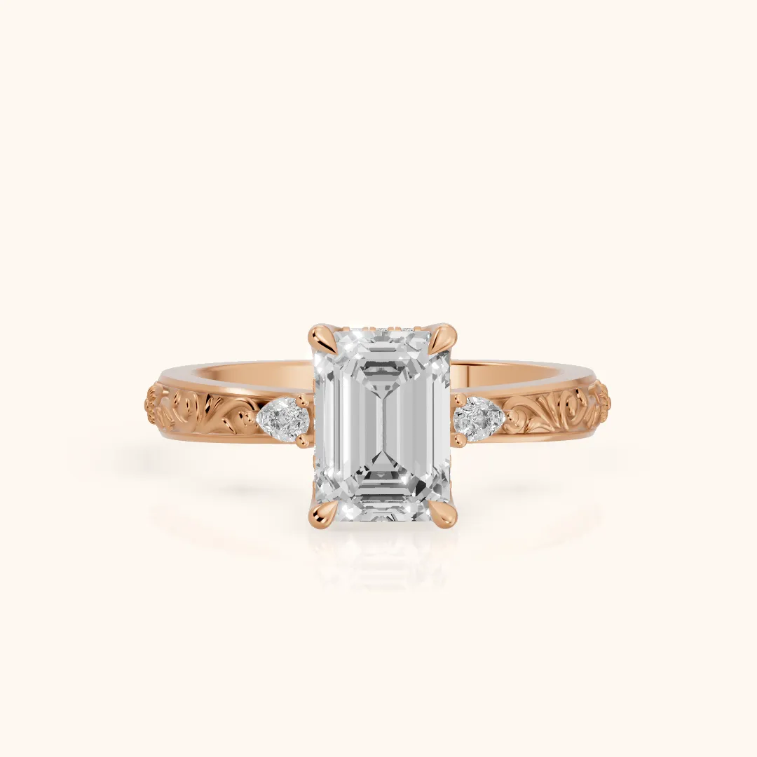Siesta Three-Stone Engraved Emerald Diamond Engagement Ring in Rose Gold — view 2