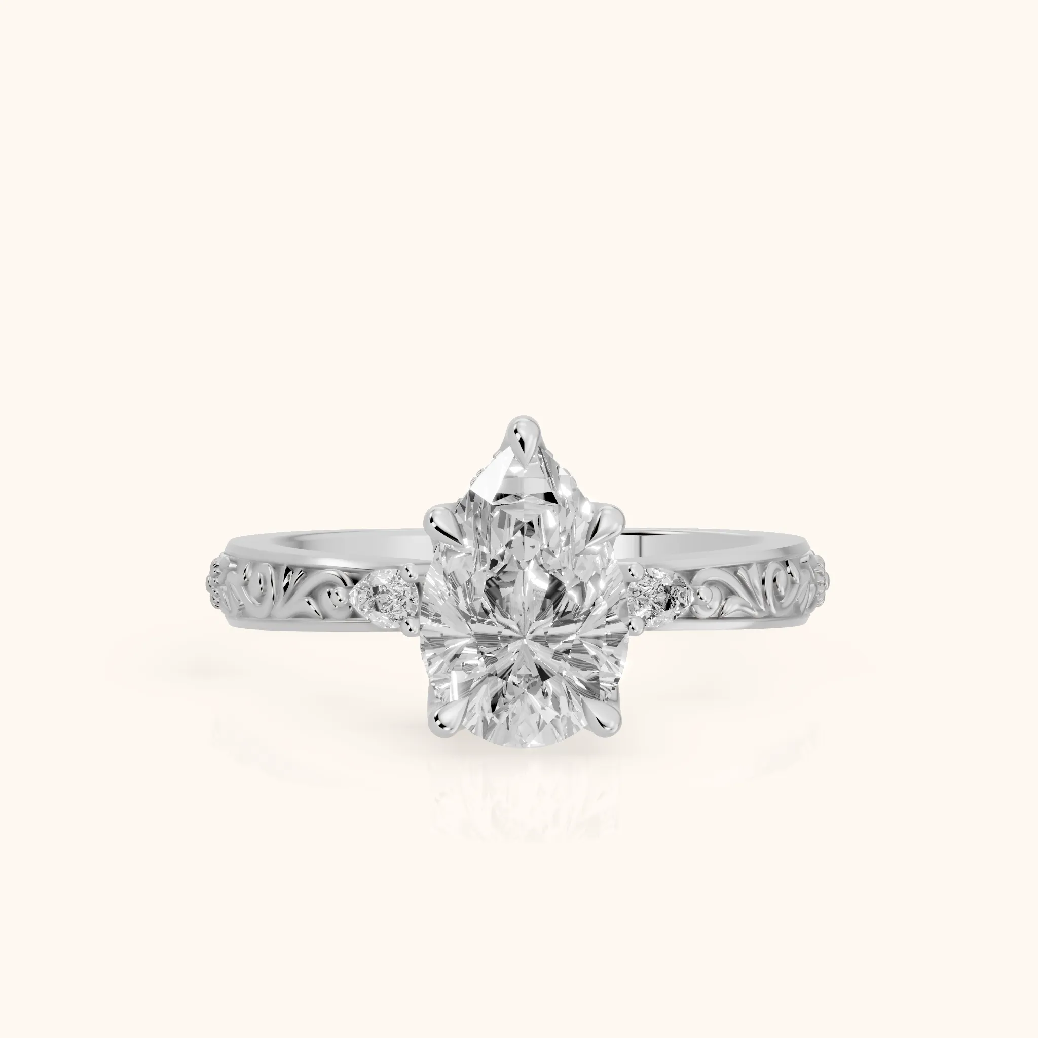 Siesta Three-Stone Engraved Pear Diamond Engagement Ring in Platinum — view 1