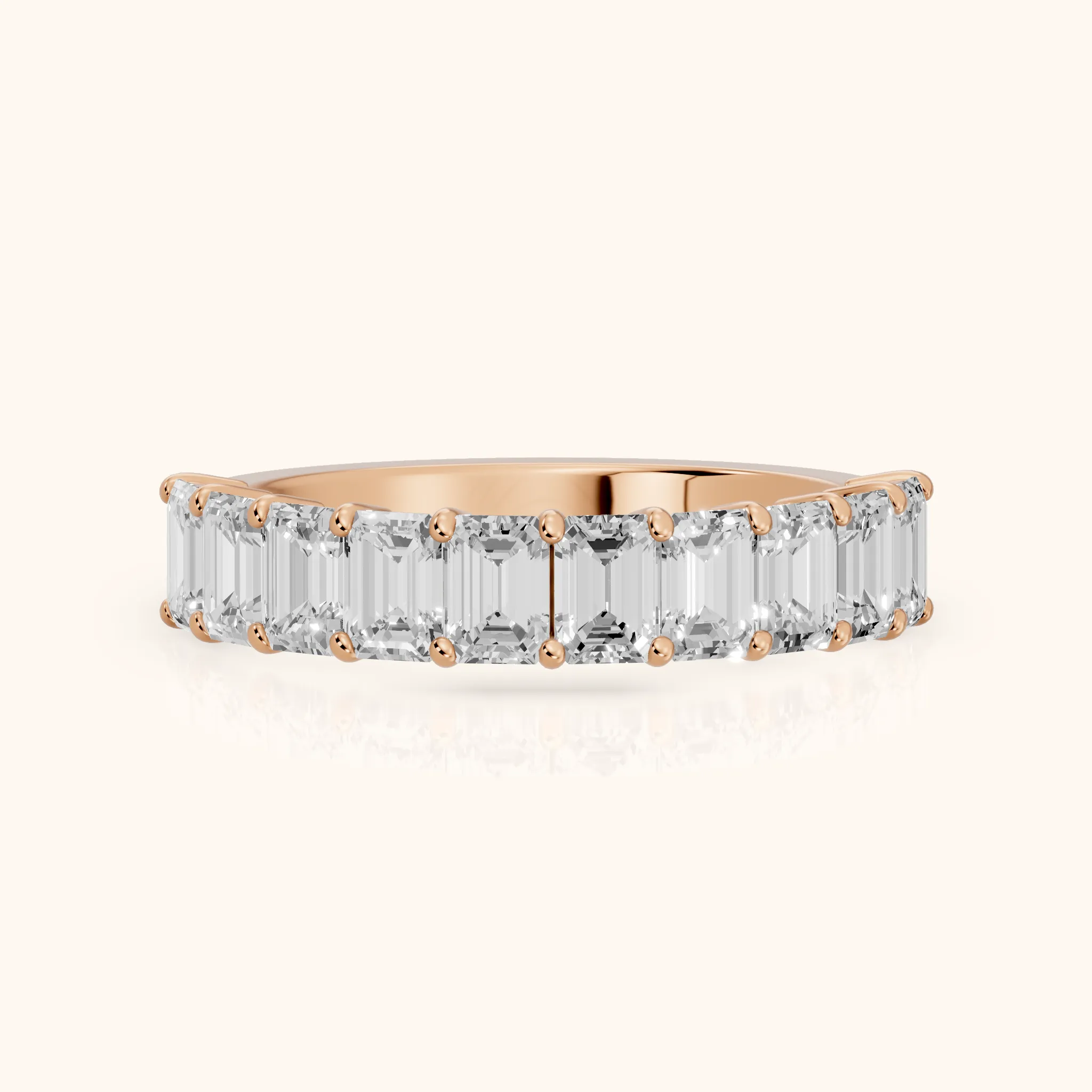 Nia Shared Prong Emerald Diamond Half Eternity Band in Rose Gold — view 1
