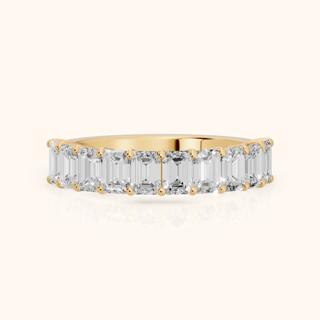 Nia Shared Prong Emerald Diamond Half Eternity Band in Yellow Gold — view 2