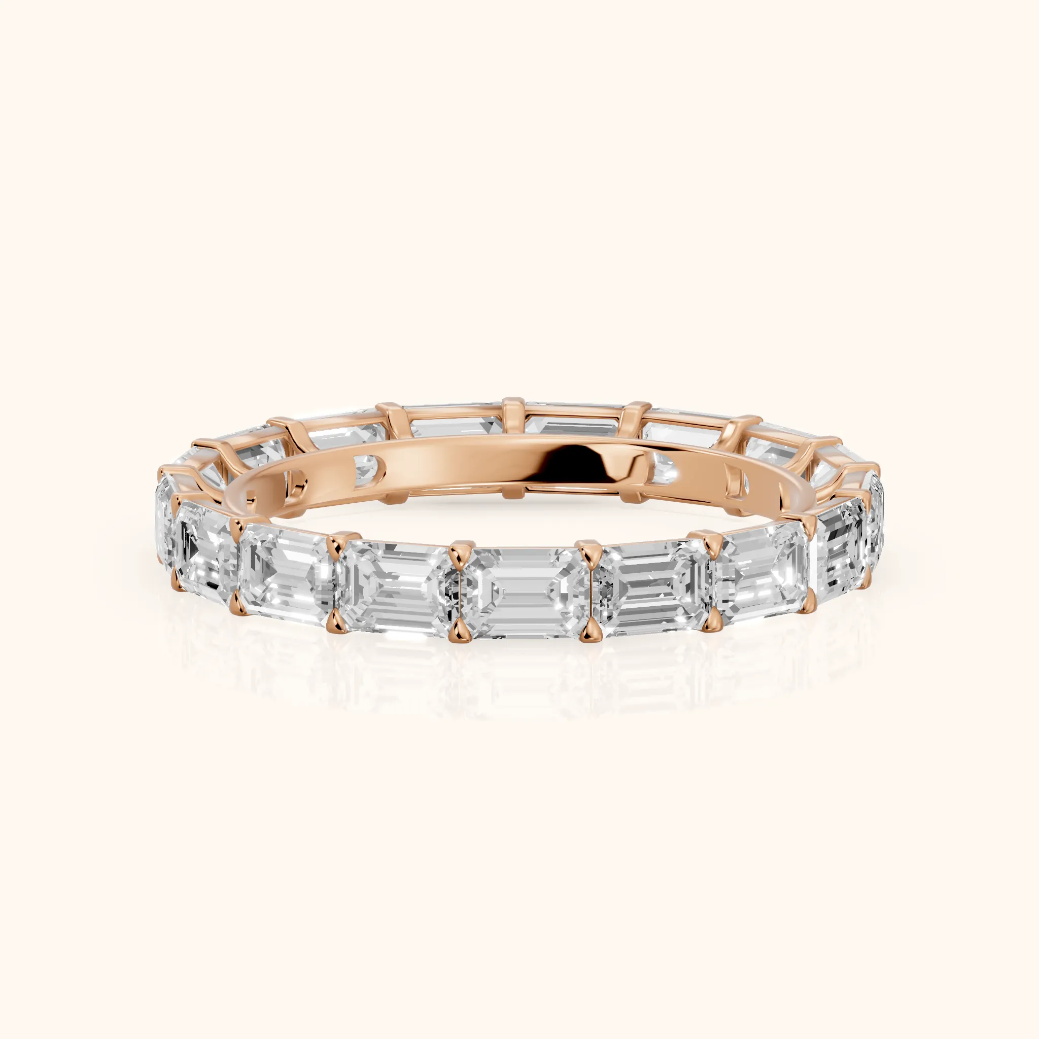 Ria East-West Emerald Diamond Eternity Band in Rose Gold — view 1