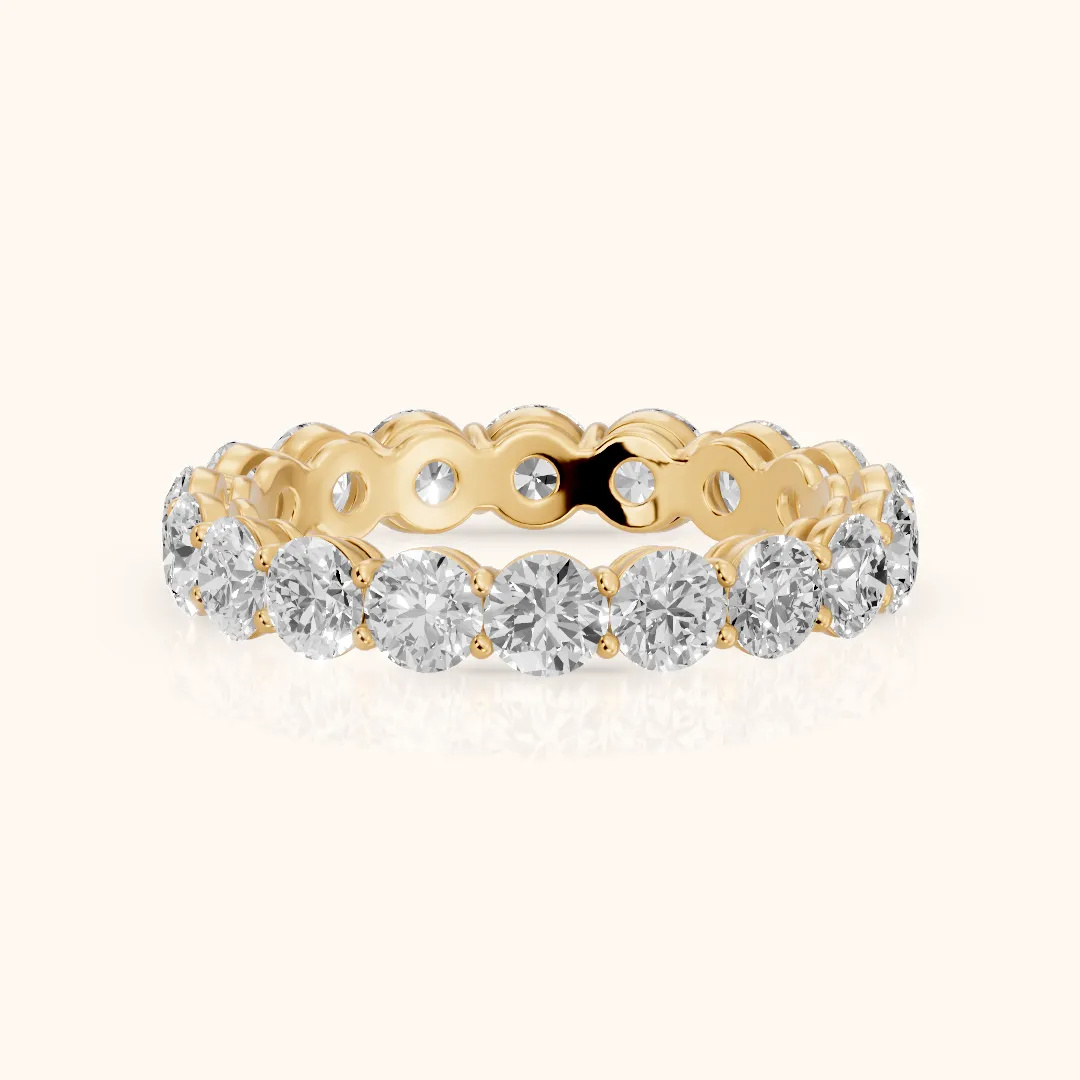 Dara Shared Prong Round Diamond Eternity Band in Yellow Gold — view 2