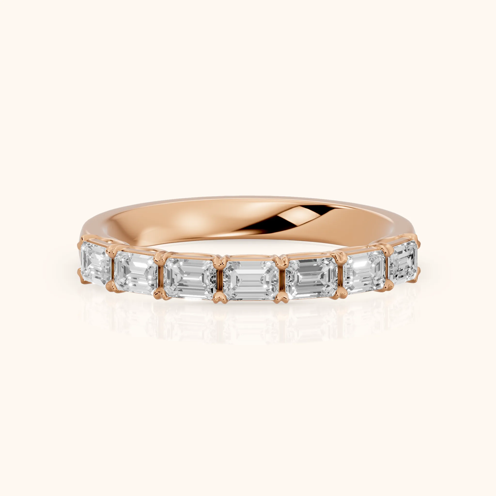 Margot Shared Prong Emerald Diamond Half Eternity Band in Rose Gold — view 1