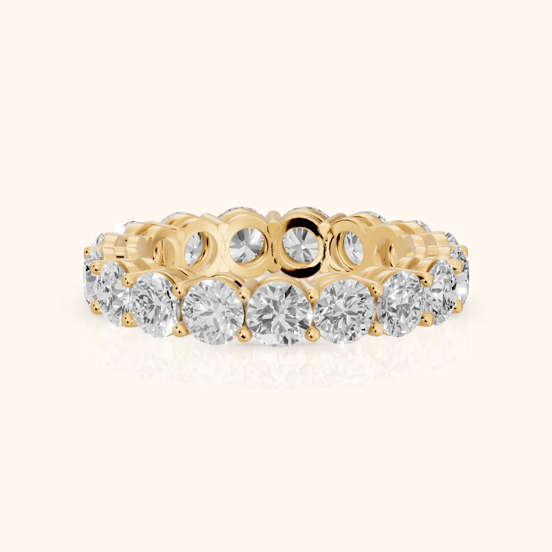 Camille Shared Prong Round Diamond Eternity Band in Yellow Gold — view 2