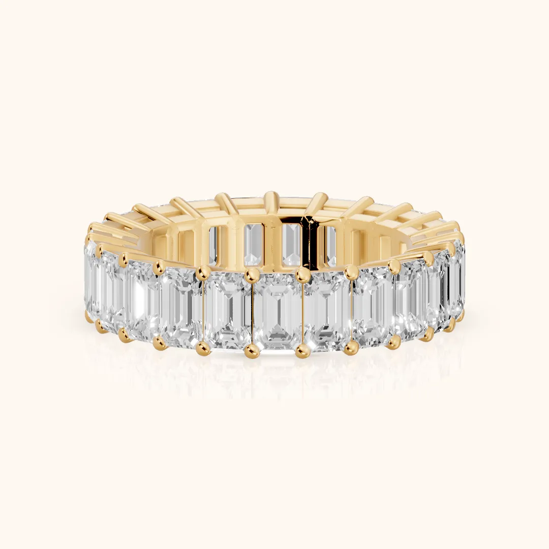 Callia Shared Prong Emerald Diamond Eternity Band in Yellow Gold — view 2