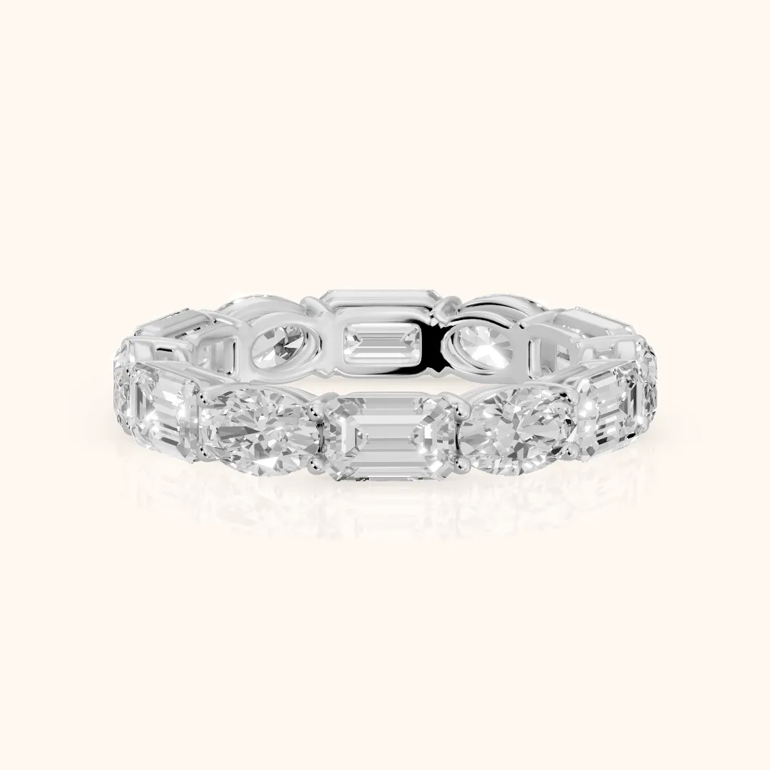 Hema Shared Prong Emerald & Oval Diamond Eternity Band in Platinum — view 2