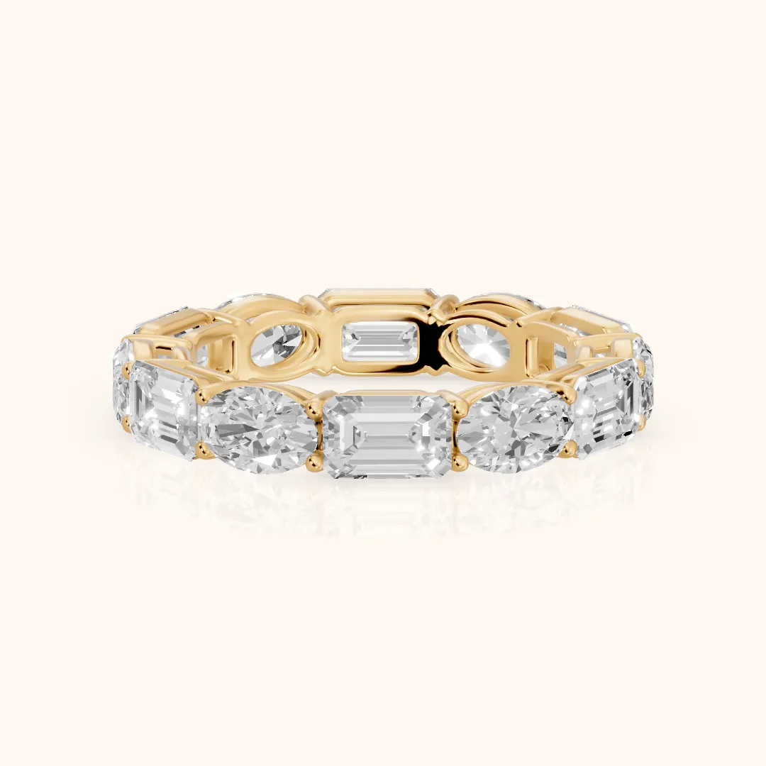 Hema Shared Prong Emerald & Oval Diamond Eternity Band in Yellow Gold — view 2
